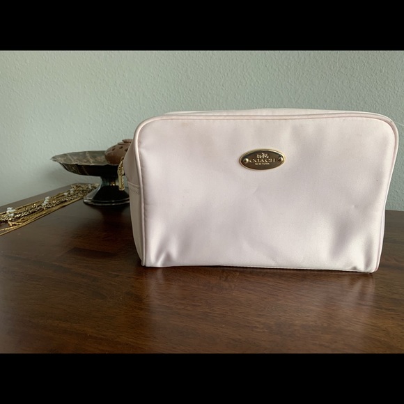 Coach Handbags - Pink satin Coach makeup bag
